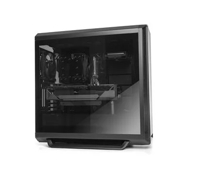 A sleek black PC tower with a tempered glass side panel reveals high-performance Stock Photos