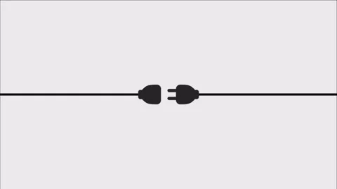 A sleek black plug and socket connect seamlessly against a soft gray backdrop. Stock Footage 327127671