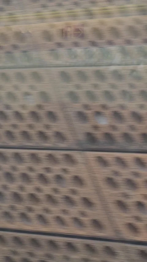 Sleek German ICE Train Speeding Swiftly Through Scenic Landscape Vídeos de archivo 318589931