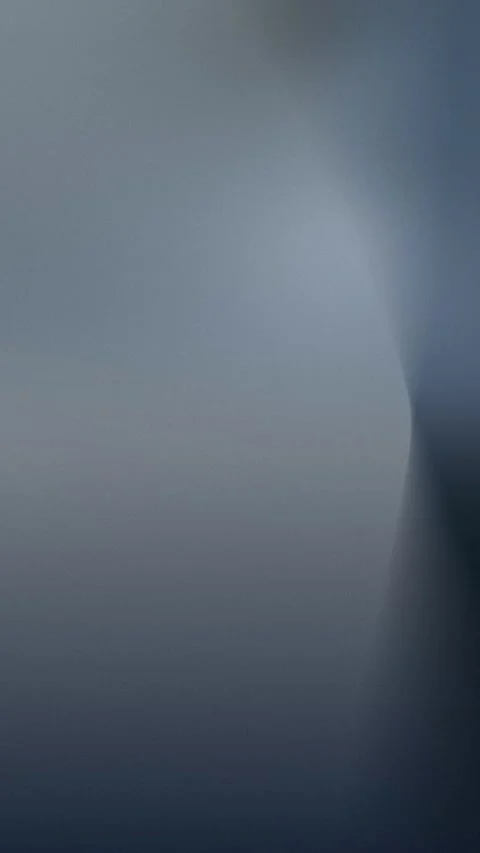 Sleek gray-blue gradient with smooth transitions. Seamless loop background. 4K Stock Footage 309701199