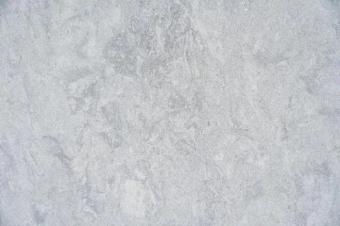 Sleek grey surface appearing to be of concrete or stone. Upside characterized by Stock Photos