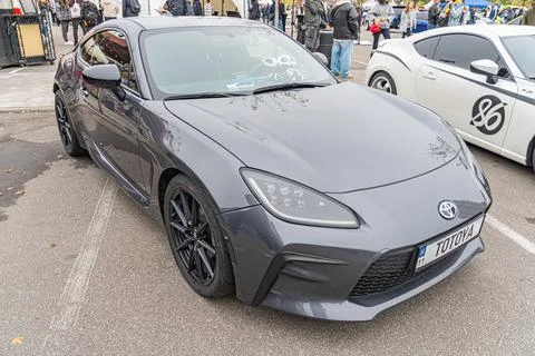A sleek, high-performance car, possibly at a show or event, with an aggressiv Stock Photos