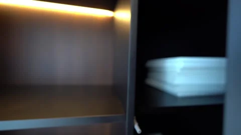 Sleek Kitchen Cabinet-Hidden Light Elegant Form 스톡 동영상 309510886