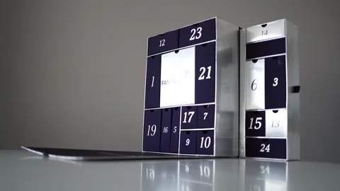 A sleek, modern advent calendar with numbered compartments, offering a stylish c Stock Footage 301106963