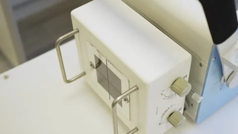 Sleek veterinary X-ray unit glows softly in sterile lab Stockbeeldmateriaal 318866140