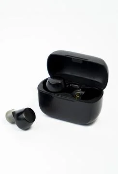 Sleek Wireless Earbuds with Touch Controls on White Background Stock-Fotos