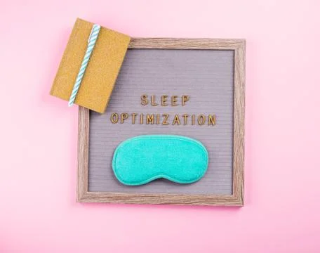 Sleep optimization phrase on letter board and diary Stock Photos