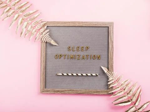 Sleep optimization text on letter board. Flat lay Stock Photos