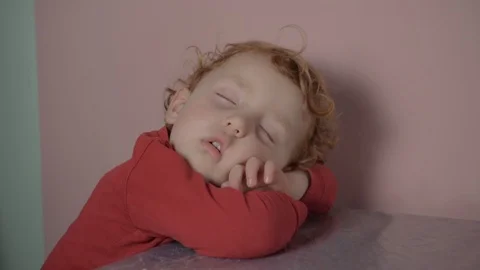 Sleeping 3 year old red-haired boy Stock-Footage 121967635