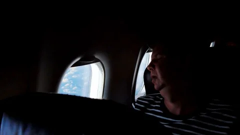 Sleeping in airplane Stock Footage 89223482