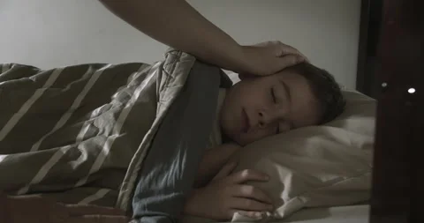 Sleeping baby in bed. Face sleeping child baby on its side. Mother care for son Stock Footage 248820508