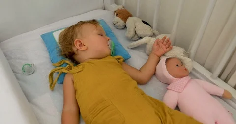 Sleeping baby infant lying in a crib Stock Video Pond5