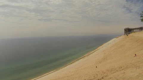 Sleeping Bear Dune Area (Part 7:  Pan of Steep Dune and Lake Michigan) Stock Footage 24975866