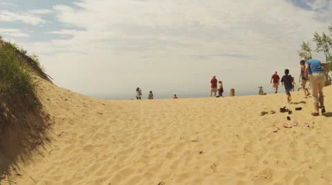 Sleeping Bear Dune Area (Part 5:  Unidentifiable People on Dunes) Stock Footage 24976002