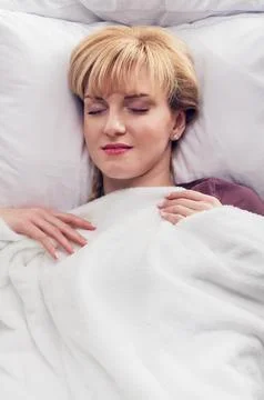 Sleeping in bed Stock-Fotos