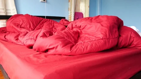 Sleeping in bed red Stock Footage 78714779
