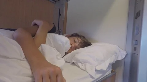 Sleeping on a berth in a train Stock Footage 83423328