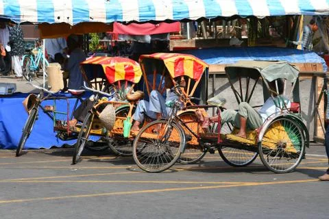 Sleeping on bicycle Stock Photos