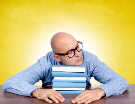 Sleeping on books Stock Photos