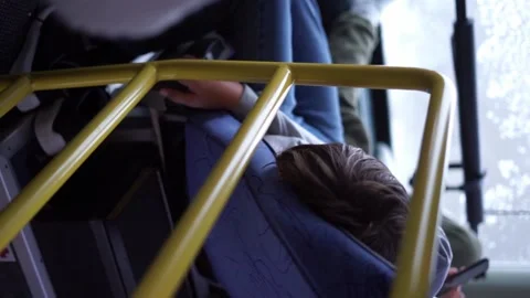 Sleeping on the bus vertical video Stock Footage 256850910