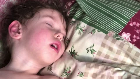 A sleeping child Video stock 174265871