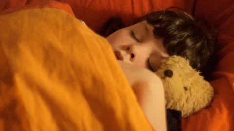 Sleeping child with teddy Stock Footage 34633409