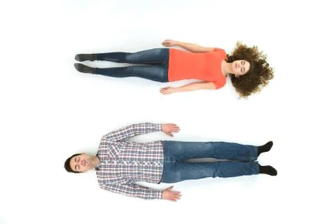 The sleeping couple lay on the white background. View from above Fotos Stock