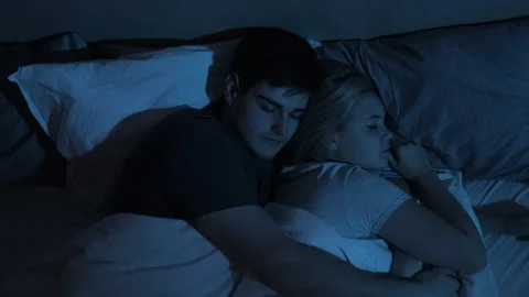 Sleeping couple night rest man cuddle woman bed Vidéo 149477514