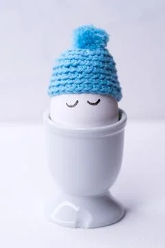 Sleeping egg with a blue hat Stock Photos