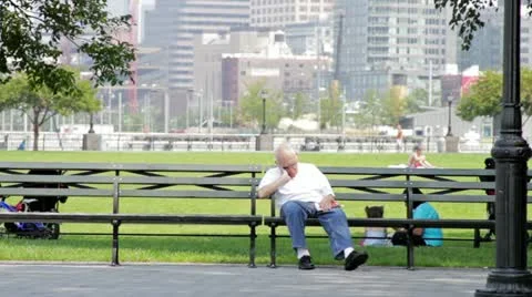 Sleeping Elderly Man on Park Bench HD Stock Footage 11916549
