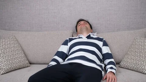 Sleeping exhausted man at home Stock Footage 267981990