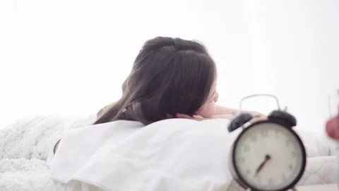 Sleeping girl on a bed Stock Footage 107045509
