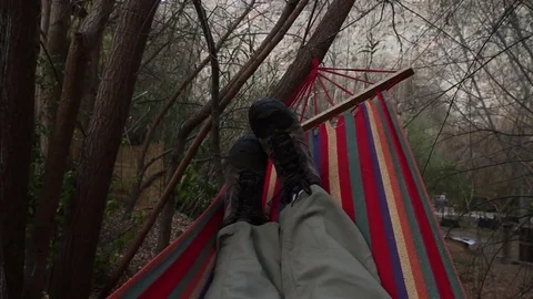 Sleeping in hammock Stock Footage 77047202