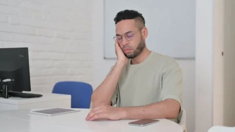 Sleeping Hispanic Man Sitting in Office Stock Footage 307906946
