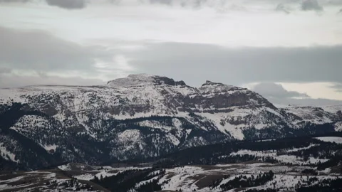 Sleeping Indian mountain time lapse with snowy hills and cloudy weather in W Stock Footage 150783605