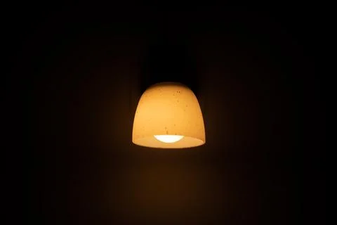 Sleeping light on the wall. Warm light. Stock Photos