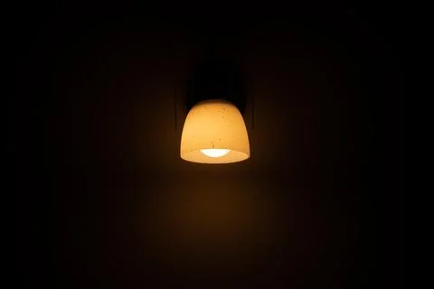 Sleeping light on the wall. Warm light. Stock Photos