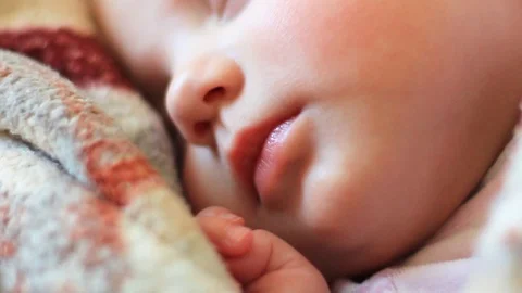 Sleeping little infant lying closeup Stock Footage 107582341