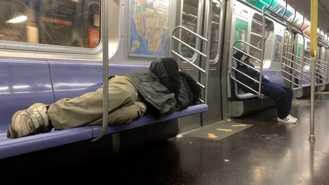 sleeping man on NYC subway train | Stock Video | Pond5