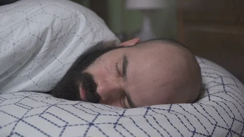 Sleeping Man Turns Face Around Vídeo Stock 88871720
