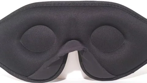 Sleeping mask made of black polyester on the inside Stock Footage 158882508