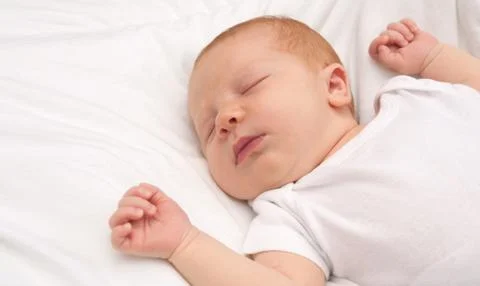 Sleeping newborn baby Stock Photos
