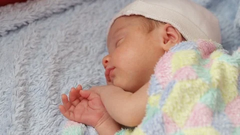 Sleeping newborn in the crib 스톡 동영상 106196398