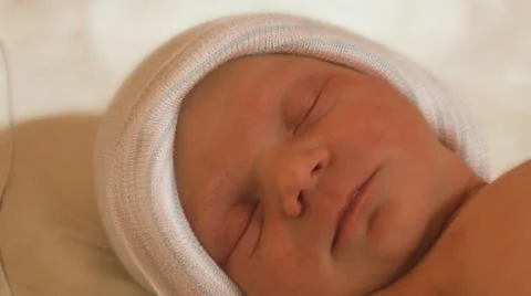 Sleeping newborn infant closeup Stock Footage