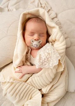 Sleeping newborn with pacifier 库存照片