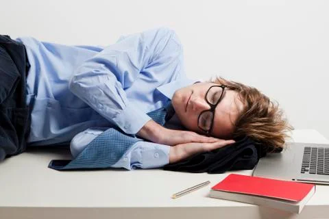 Sleeping in the office Stock Photos