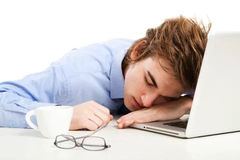 Sleeping over the laptop Stock Photos