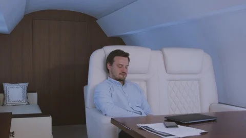 Sleeping at private jet. Stock Footage 112738836