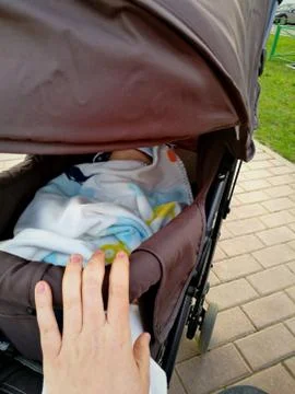 Sleeping in a stroller Foto stock