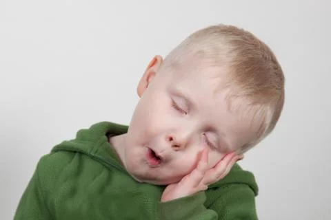 Sleeping studio kid Stock Photos